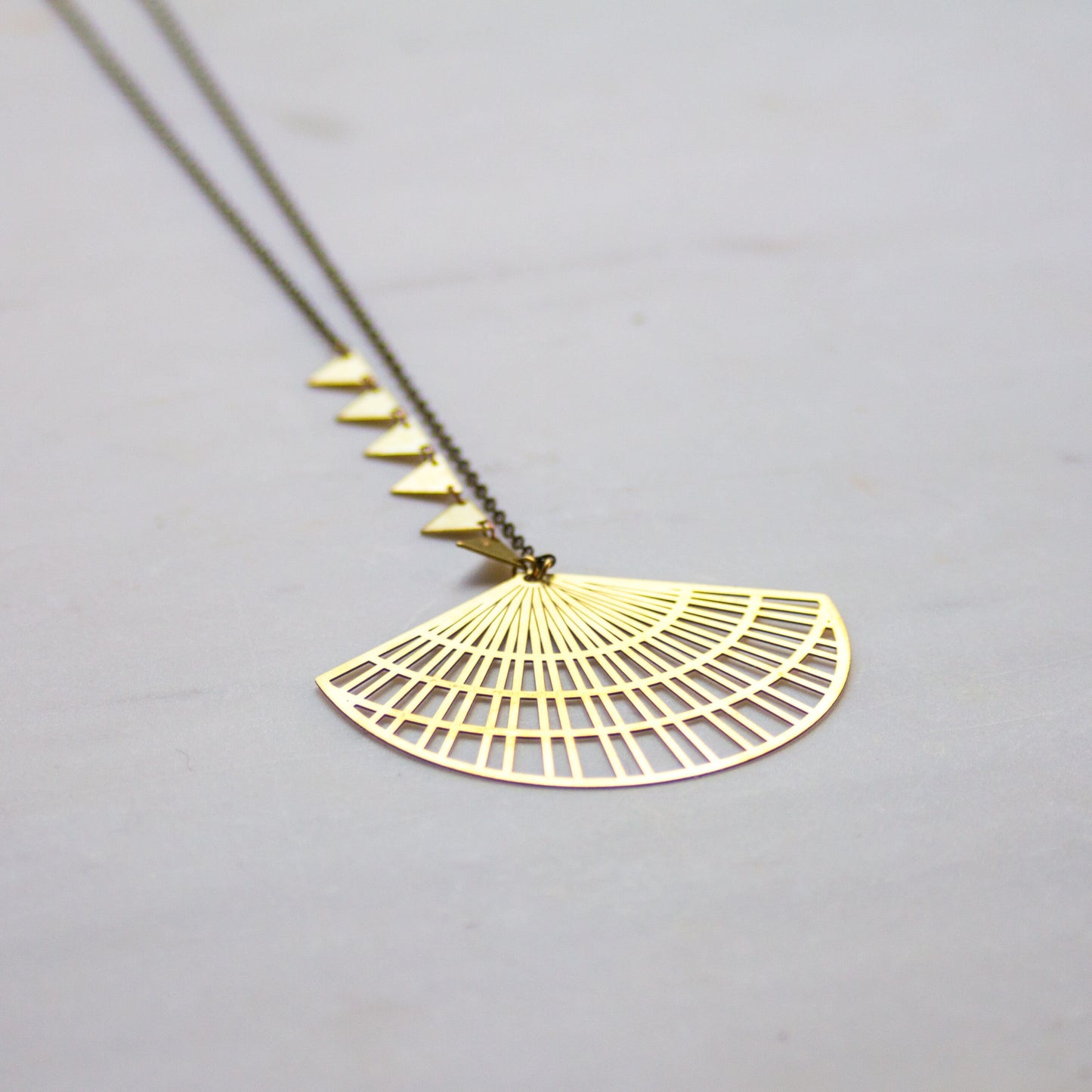 Gold triangle pendant necklace, asymmetrical jewelry, boho fan necklace